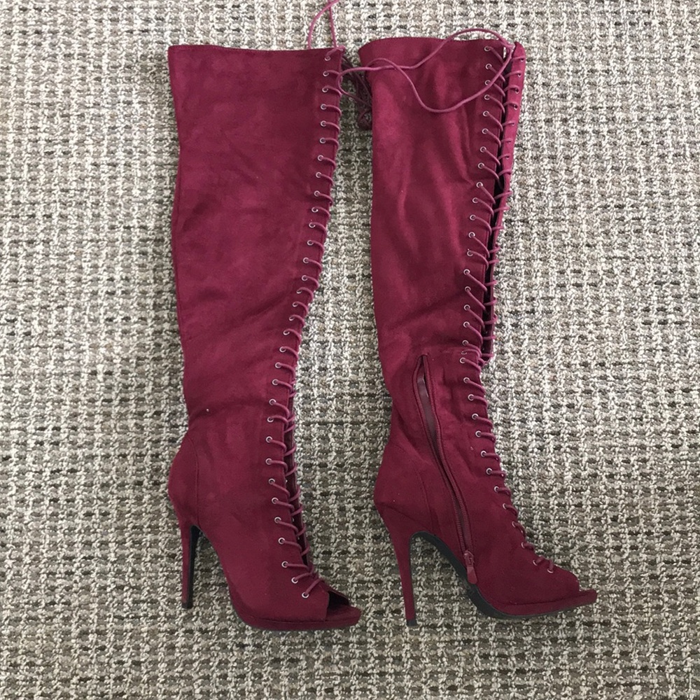 Laced up high heel boots